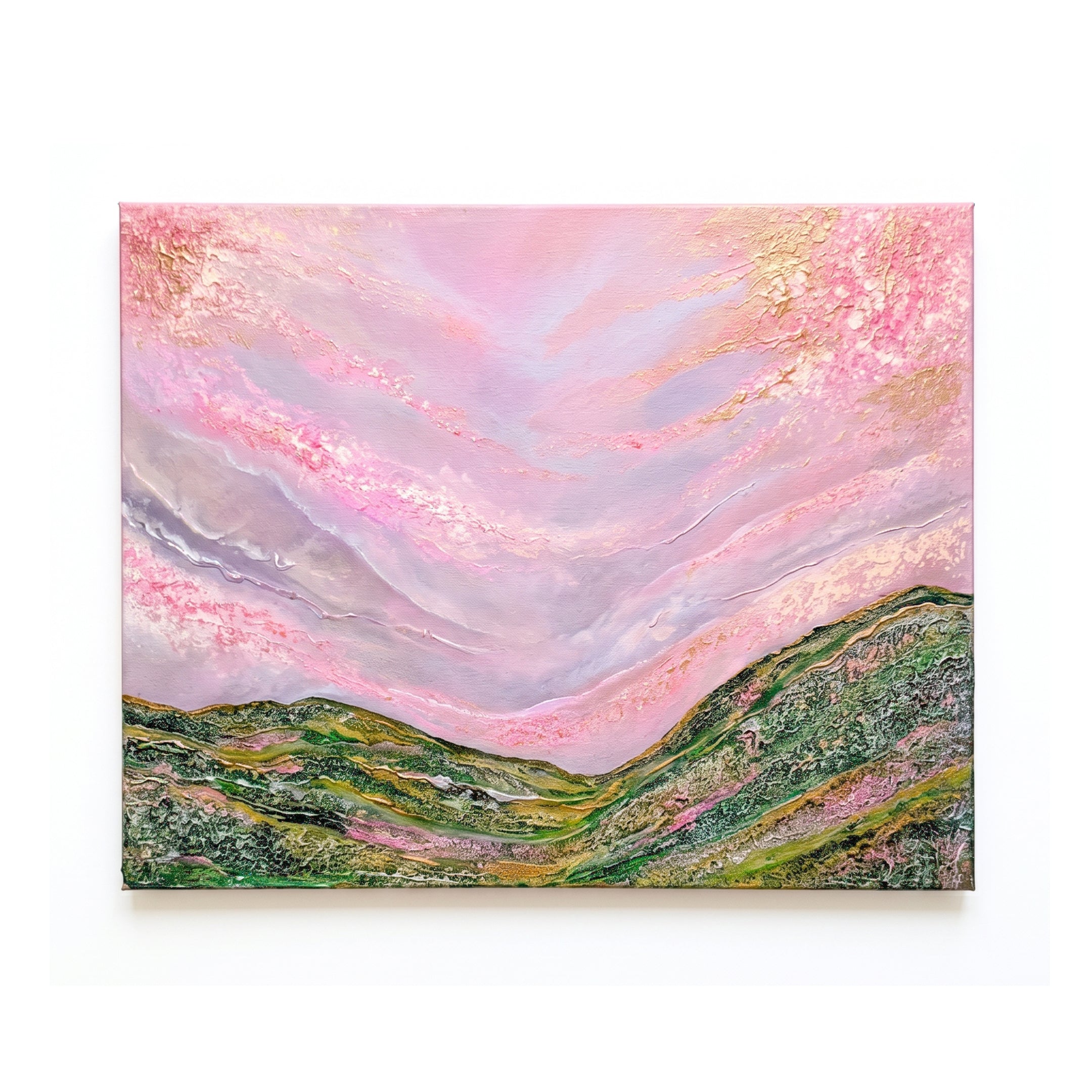 Mountain meadow with pink sky